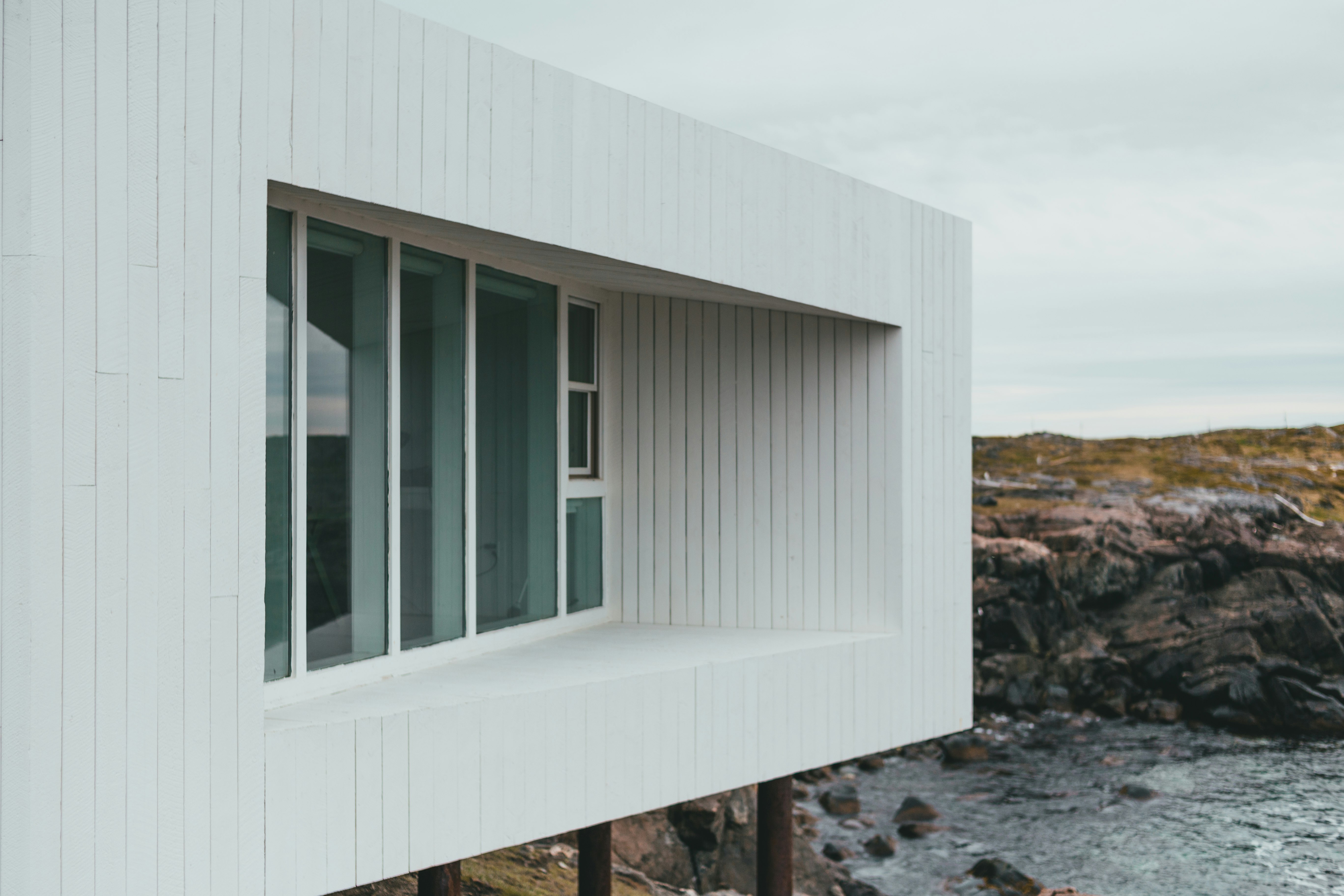 white wooden framed glass window